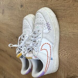 Nike Women’s White Sneakers with Purple and Orange Accents